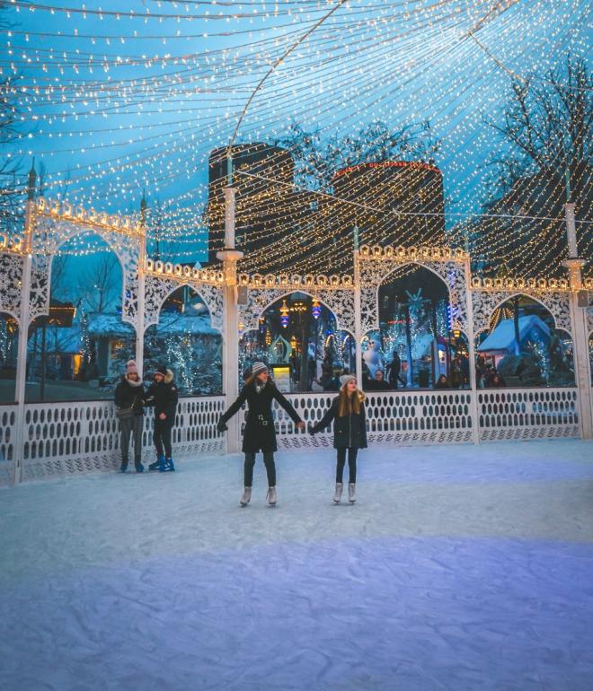 Ice skating in front of the magical Nimb Hotel in the iconic Tivoli Gardens