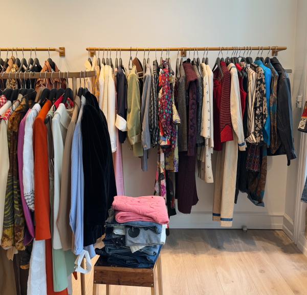 Racks of vintage clothes in a store